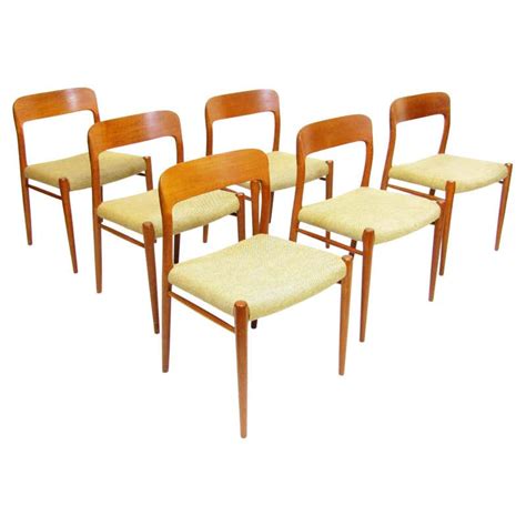 Eight Danish Dining Chairs Model 75 By Niels Moller In Teak And Papercord At 1stdibs Niels