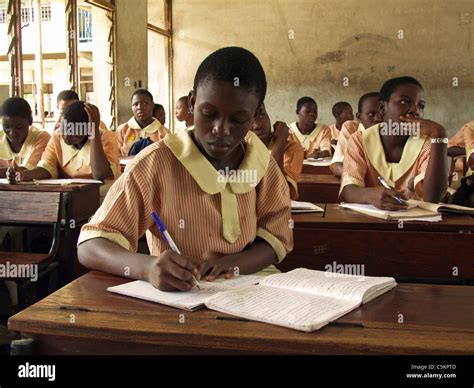 Lagos Nigeria Teenage Female Student Seated At A Desk In A Classroom