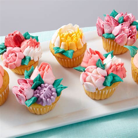 Here we can see decorating with wilton 1m tip cupcake, cupcake decorating tips and wilton 1m tip cupcake, they are the best photos of what wilton tip to frost cupcakes. Easy Blooms Mini Cupcakes | Wilton