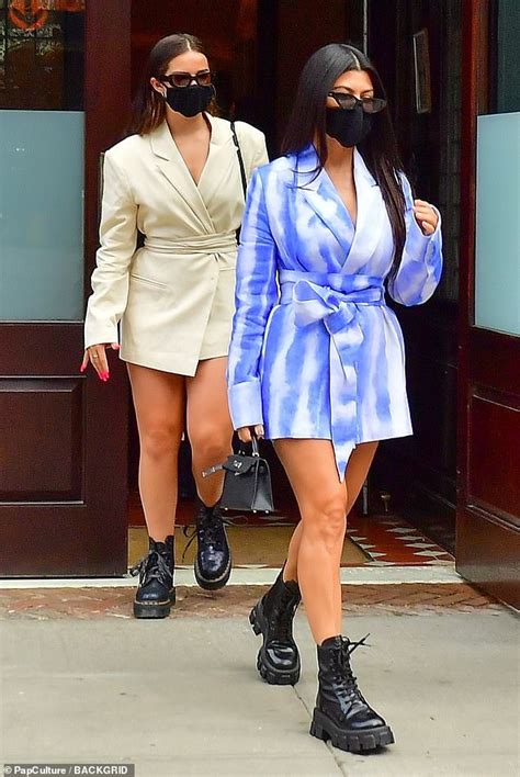 Kourtney Kardashian And Addison Rae Match In Tiny Wrap Dresses And Black Leather Ankle Boots In