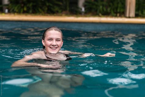 Teen Girl Swimming In Pool By Stocksy Contributor Gillian Vann