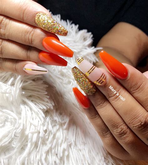 Orange Nail With Gold Glitter Orange Acrylic Nails Gold Nails