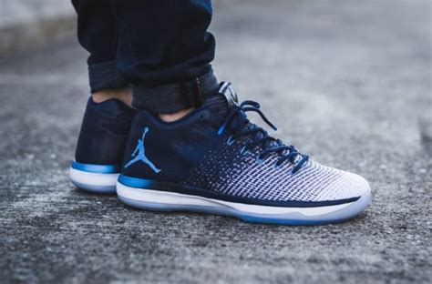 As always, the upper is crafted from layers of leather — both grained and smooth — and features two of. Relase Reminder: Air Jordan 31 Low Midnight Navy ...