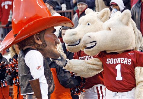 Cowboy And Sooner Mascots At Sooner Football Game Boomer Sooner