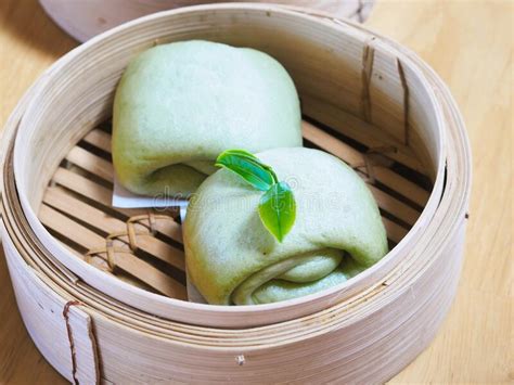 Green Steamed Buns Or Mantou Or Salapao With Green Tea Leaf Stock Photo