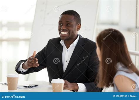 Excited African American Employee Speak Emotional At Business Me Stock