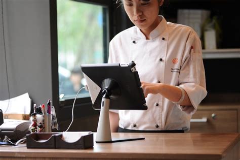 Your search for fabric is over! iPad POS with IPEVO Perch Stand at a restaurant counter ...