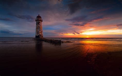 Beach Sunset Sea Lighthouse Wallpaper Coolwallpapersme