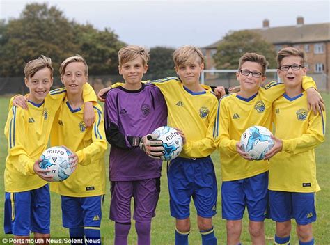 Youth Football Team With Three Sets Of Identical Brothers Storm To The