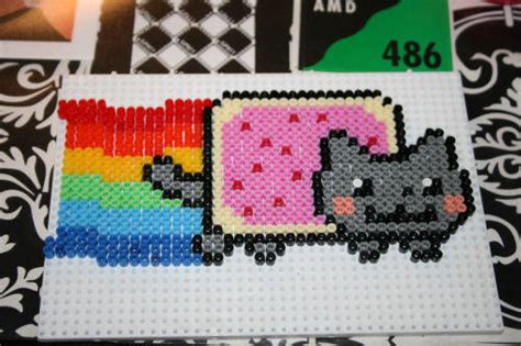 Het is hetzelfde principe als het pointillisme; DIY Bügelperlen Pixel Art