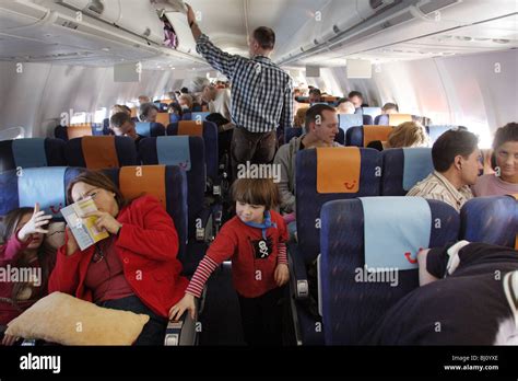 Passengers On An Aeroplane Stock Photo Alamy
