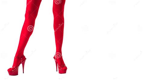 Female Legs In Fetish Red Stockings And Red High Heels Isolated On White Dance And Show Stock