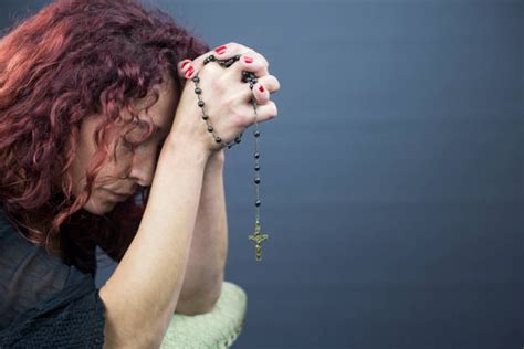 Pray Rosary Stock Photos Pictures And Royalty Free Images Istock