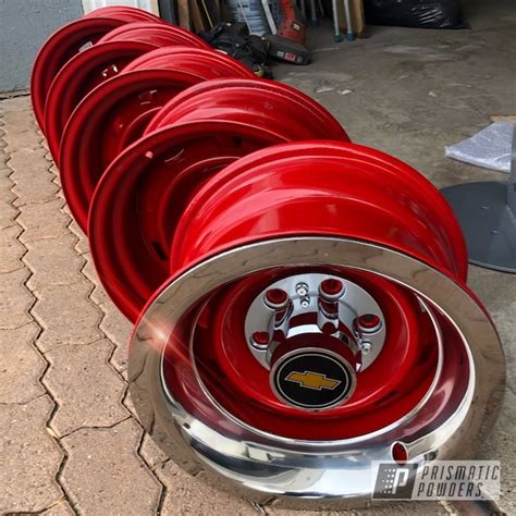 15 Factory Chevy Rally Wheels Done In Really Red Prismatic Powders