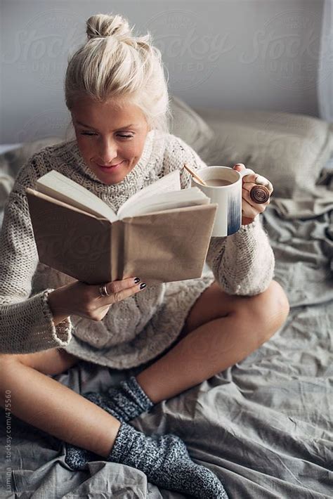 Smiling Caucasian Woman Reading A Book And Drinking Coffee On A Winter Morning Book Club Food