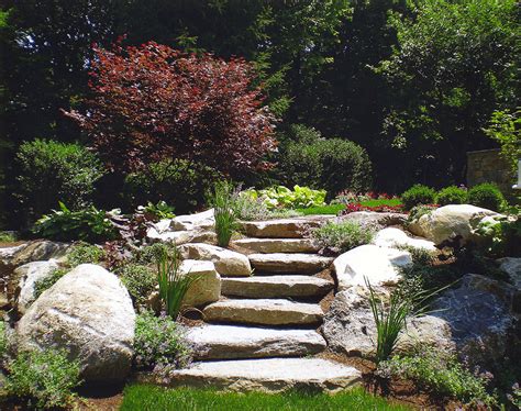 Boulders landscaping has 20+ years experience creating custom landscapes including patios, retaining walls, ponds and water features. Natural Boulder / Step Creations | Femia Landscaping