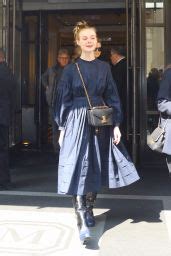 Elle Fanning In A Long Sleeved Navy Blue Dress Nyc