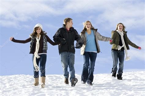 Young People Having Fun In The Snow — Stock Photo © Yobro10 41592417