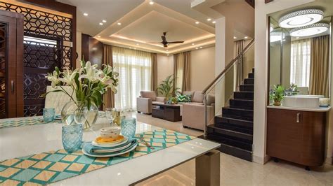 Decorating small spaces is quite simple but when it is about redefining the interior look of a big sized space, then definitely the task becomes more challenging yet interesting. Shwetha & Binod's JR Greenwich Villa Interiors | Bangalore ...