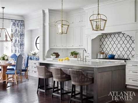 This kitchen is charming because its balance it met in design and color! 2018 Kitchen of the Year Winners - AH&L