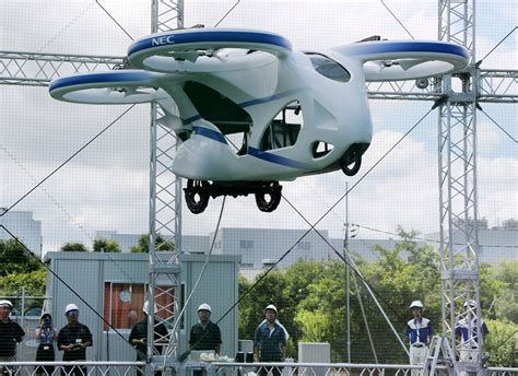 Watch Japans Nec Shows Flying Car Hovering Steadily For Minute