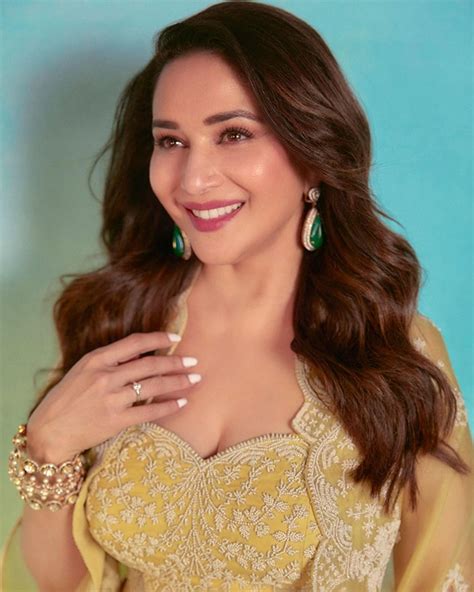 Madhuri Dixit Looks Like Sunshine In Yellow Organza Cape Set For Rs 1