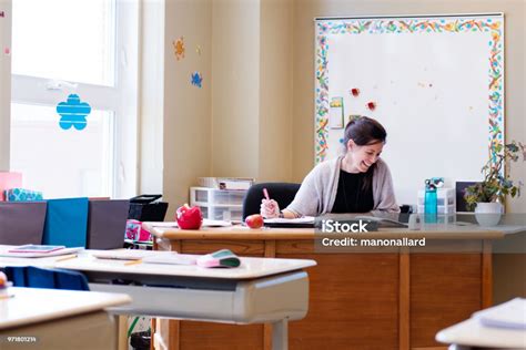 Teacher In A Classroom Without Students At Schools Out Stock Photo