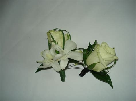 White Rose And Orchids Corsage And Boutonnieres Plushflowersca