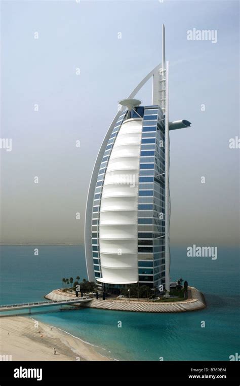 View Of The Sail Shaped Burj Al Arab Hotel And Jumeirah Beach Dubai