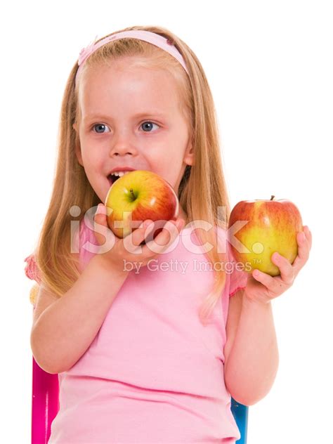 Little Girl With Apple Stock Photo Royalty Free Freeimages