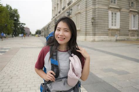 Young Asian Woman Visiting Europe In Holidays As Backpacker Tourist