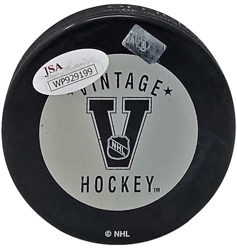 brock boeser autographed vancouver canucks vintage puck house of hockey