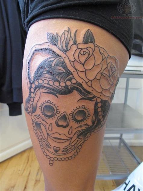 Weeping Sugar Skull And Flowers Tattoo On Thigh