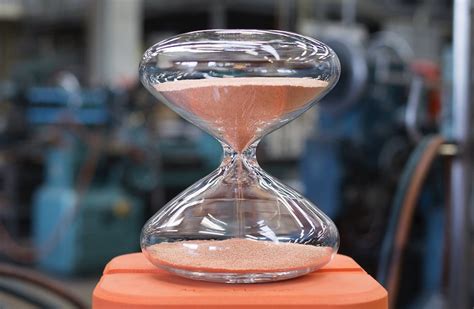 Watch A Mesmerizing Hourglass Filled With 1250000 Nanoballs