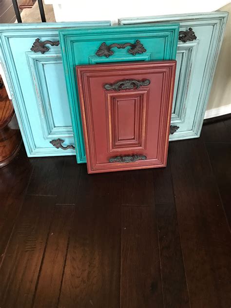 Old Cabinet Doors Refurbished Into Decorative Trays From Left To Right