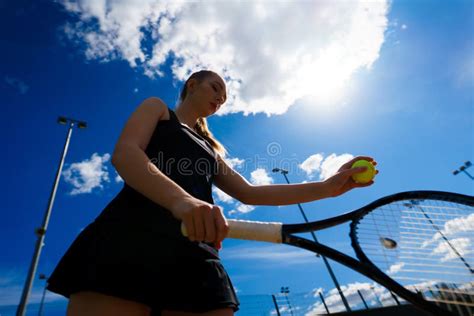 Girl Tennis Player Holding Tennis Racket On The Court Young Woman Is