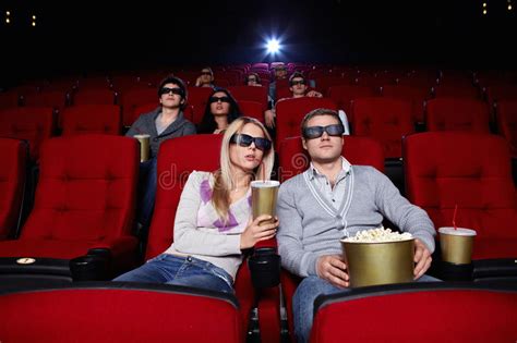 You should look it up and try it out. People Watch Movies In Cinema Stock Image - Image of ...
