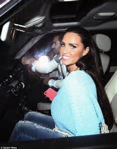 Katie Price Dons Stomach Baring Jumper And Ripped Jeans On