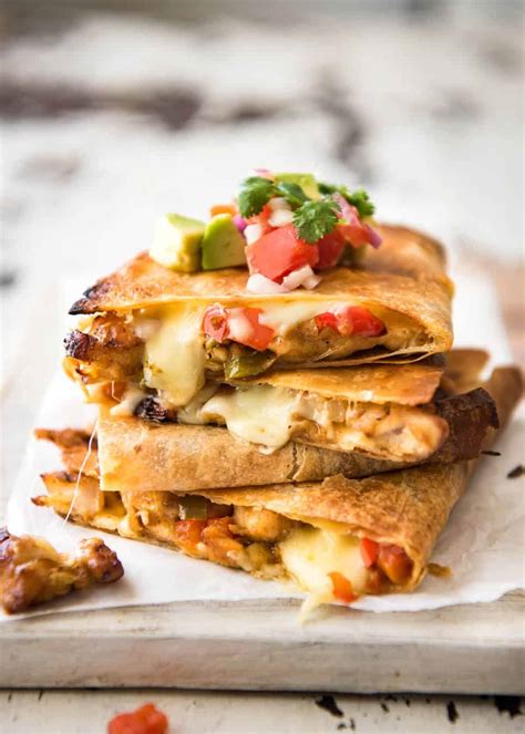 Chicken quesadillas are a great way to use leftover cooked chicken breast, and this recipe is so fast, you can have dinner on the table in 15 minutes! Oven Baked Chicken Quesadillas | RecipeTin Eats