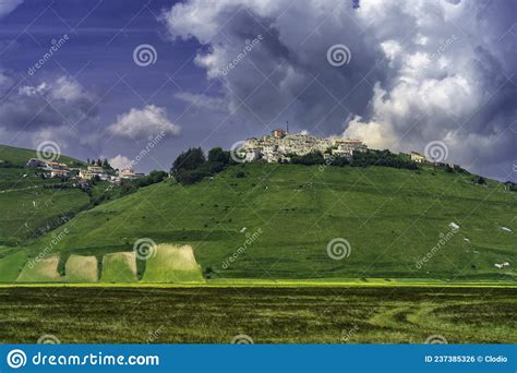 Piano Grande Di Castelluccio Mountain And Rural Landscape Stock Photo