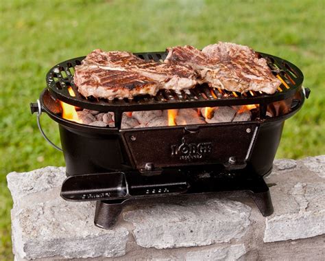 Its small size and cylindrical design make it unique. Sportsman's Charcoal Grill - Lifestyle