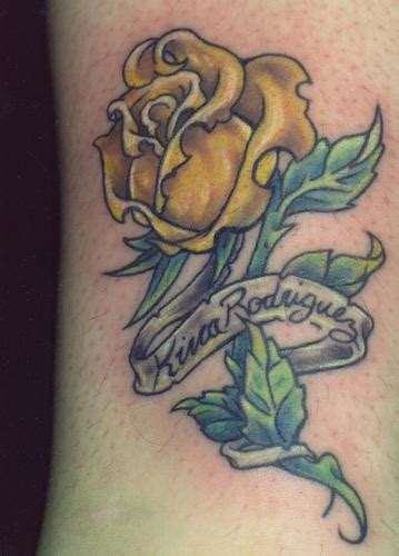 Rose tattoo with a blue ribbon. Yellow Rose Tattoos Designs, Ideas and Meaning | Tattoos ...