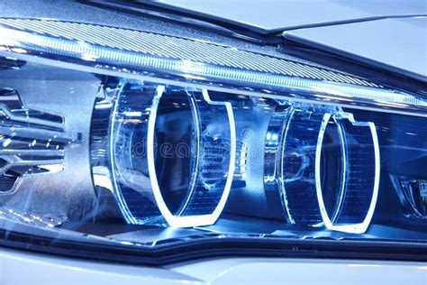 Car Light Detail In Blue Tone Vehicle Part Vertical Stock Photo