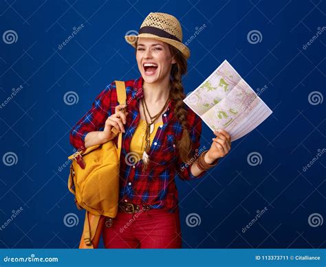 Happy Traveller Woman Isolated On Blue Background With Map Stock Image