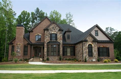 Upper Class Luxury Home With Intricate Stonework And Brick Brick