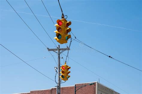 Two Traffic Lights Hang From A Wire Stock Image Image Of Warning
