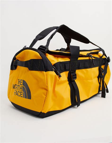 The North Face Synthetic Base Camp Medium Duffel Bag 71l In Yellow For