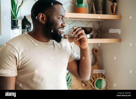 African American Attractive Male Drinking A Pure Water Follow Healthy