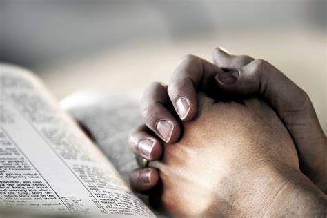 Praying Hands On Bible Pray