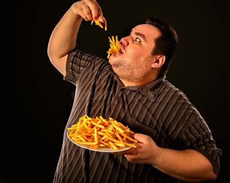 Fat Man Eating Fast Food French Fries For Overweight Person Stock